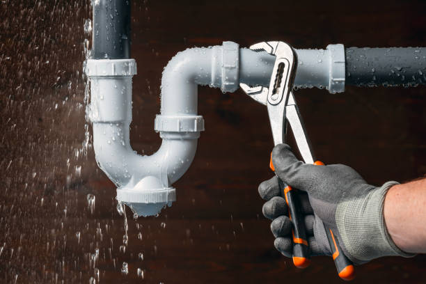 Professional Plumbing technician working in Camp Lake, WI
